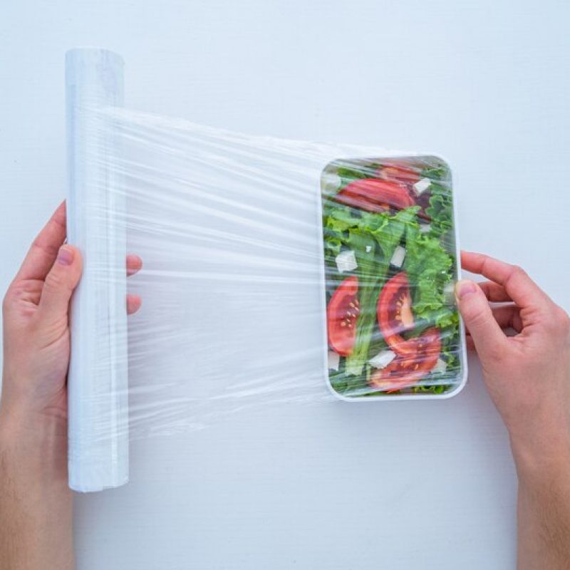 [freepicdownloader.com]-using-food-polyethylene-plastic-film-food-storage-fridge-home-medium